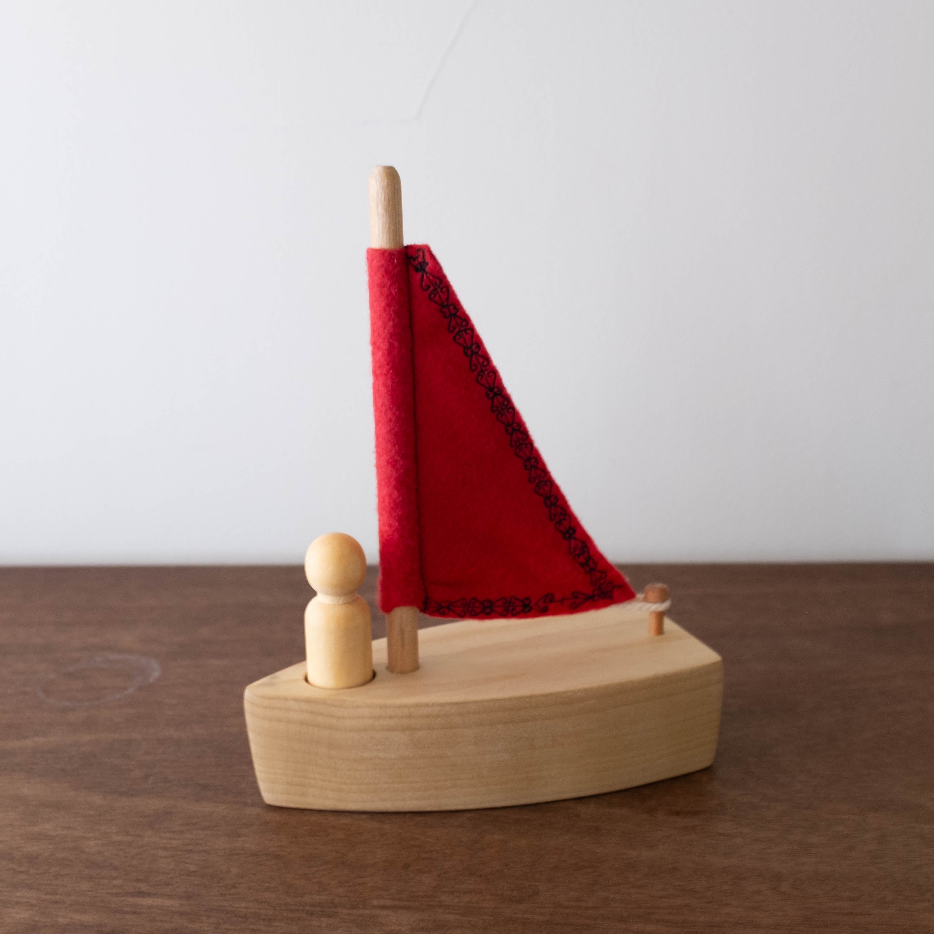 Wooden Sailboat with Peg Doll